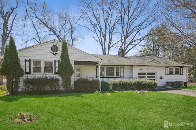 1779 Hughes Ter, Piscataway, NJ 08854 - tri-level home featuring a chimney, a front yard, and a porch