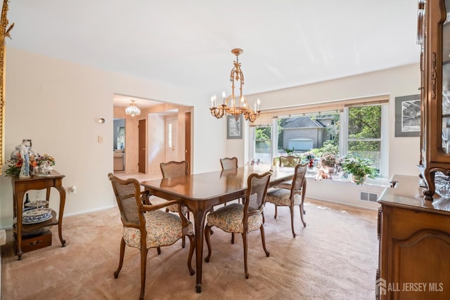 20 Buffalo Run, East Brunswick, NJ 08816 - dining space with a chandelier and light colored carpet