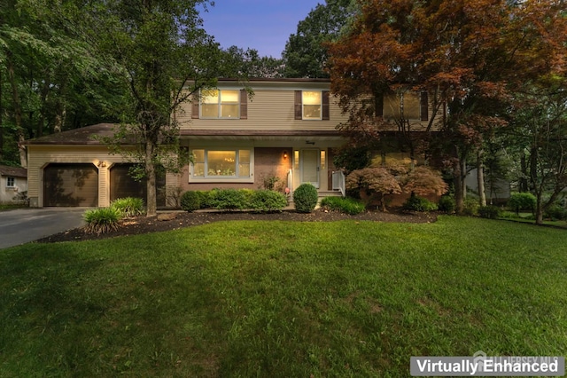 20 Buffalo Run, East Brunswick, NJ 08816 - traditional-style house with driveway, a garage, and a front lawn