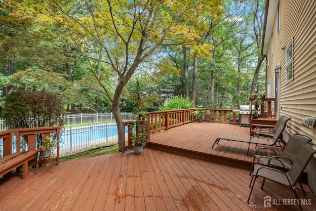 20 Buffalo Run, East Brunswick, NJ 08816 - deck with area for grilling and view of wooded area