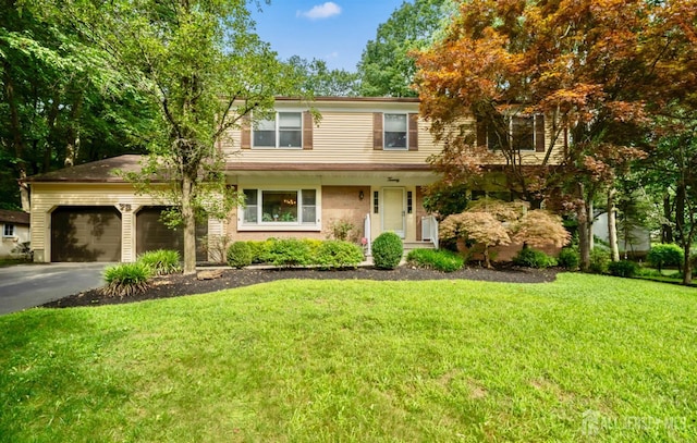 20 Buffalo Run, East Brunswick, NJ 08816 - traditional-style home featuring driveway, a garage, and a front lawn