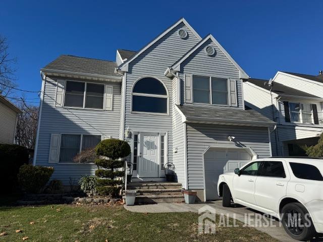 view of front of house with a garage