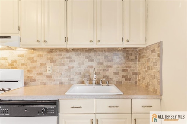 kitchen with dishwasher, range, backsplash, white cabinets, and sink