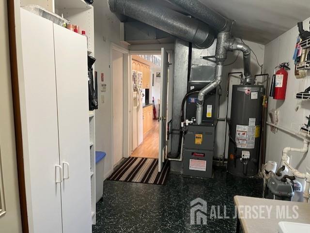 12 Landry Rd, Franklin, NJ 08873 - utility room with water heater