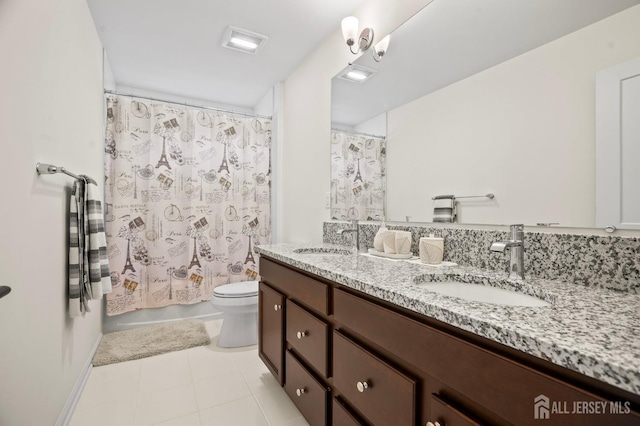 bathroom with shower / tub combo, a sink, toilet, and double vanity