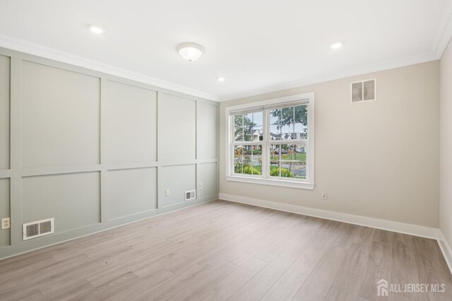 101 Country Club Dr Unit 6, Union Twp, NJ 07083 - spare room featuring light wood-style flooring, ornamental molding, and recessed lighting