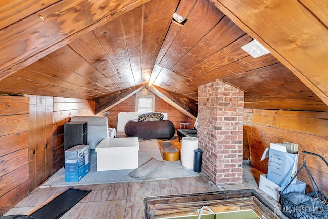 bedroom featuring lofted ceiling, wooden ceiling, and wood walls