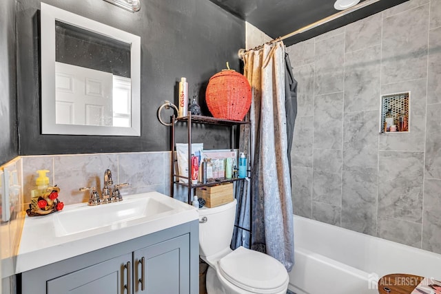 full bathroom featuring vanity, toilet, and shower / bath combo