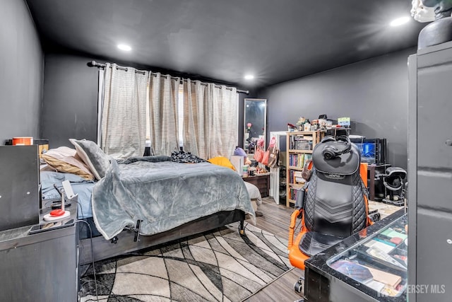 bedroom featuring light wood-type flooring