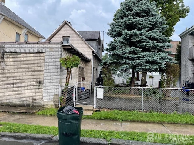 82 Pulaski Ave, Carteret, NJ 07008 - view of side of property featuring brick siding