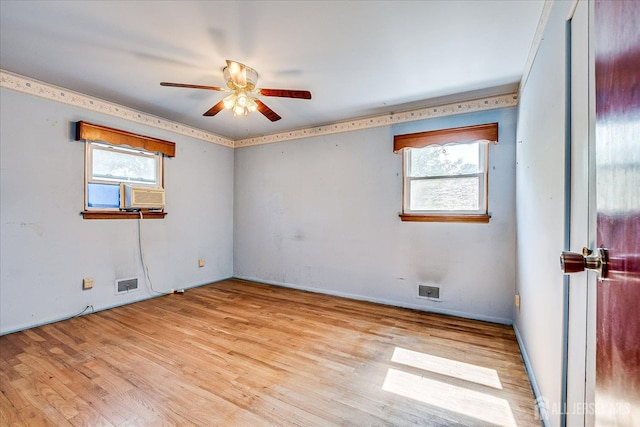14 Mcginnis Rd, Edison, NJ 08817 - unfurnished room with ceiling fan, healthy amount of natural light, cooling unit, and light wood-type flooring