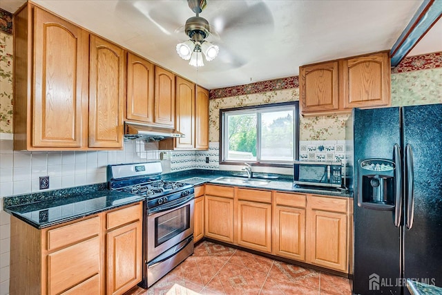 14 Mcginnis Rd, Edison, NJ 08817 - kitchen with appliances with stainless steel finishes, under cabinet range hood, ceiling fan, decorative backsplash, and wallpapered walls