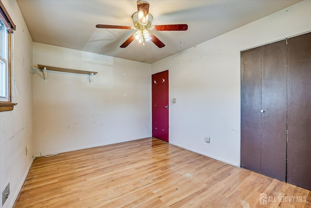 14 Mcginnis Rd, Edison, NJ 08817 - unfurnished bedroom with wood finished floors, ceiling fan, and a closet