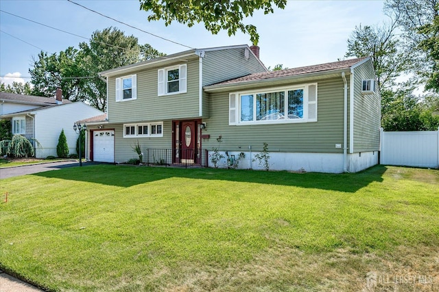 14 Mcginnis Rd, Edison, NJ 08817 - tri-level home with a chimney and driveway