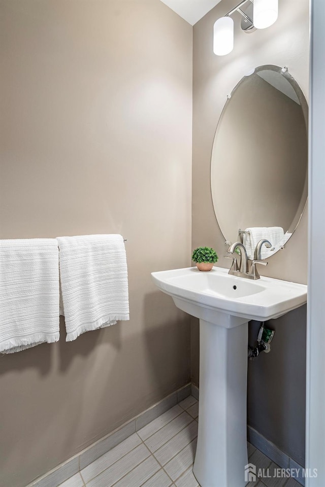 bathroom with tile patterned flooring