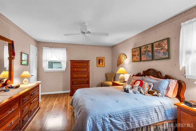 423 Brentwood Dr, Piscataway, NJ 08854 - bedroom featuring light wood-type flooring, wallpapered walls, a ceiling fan, baseboards, and crown molding