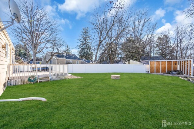 view of yard featuring a deck