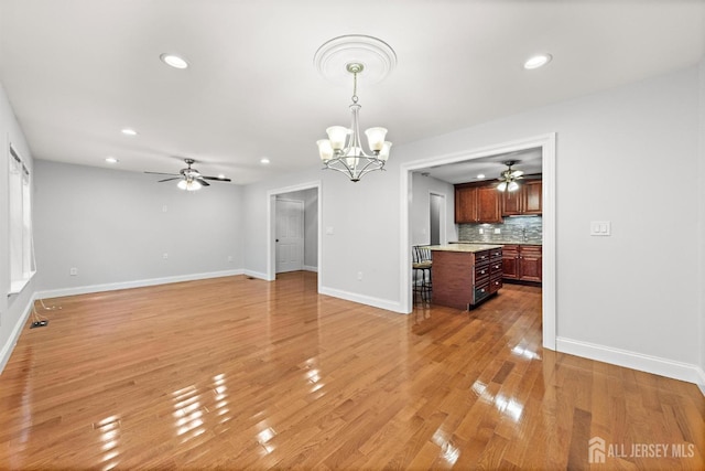 15-A Betsy Ross Dr, Monroe, NJ 08831 - interior space featuring baseboards, recessed lighting, and ceiling fan with notable chandelier