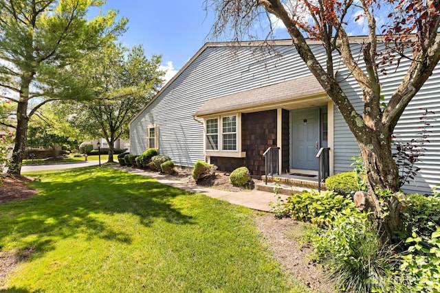 15-A Betsy Ross Dr, Monroe, NJ 08831 - view of front of house with a front lawn and a shingled roof