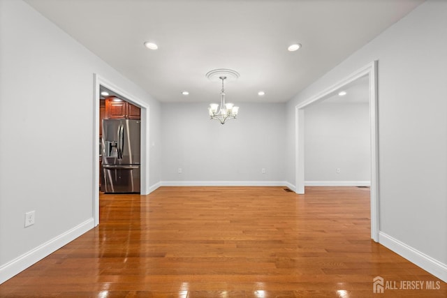 15-A Betsy Ross Dr, Monroe, NJ 08831 - empty room with a chandelier, recessed lighting, light wood-style floors, and baseboards