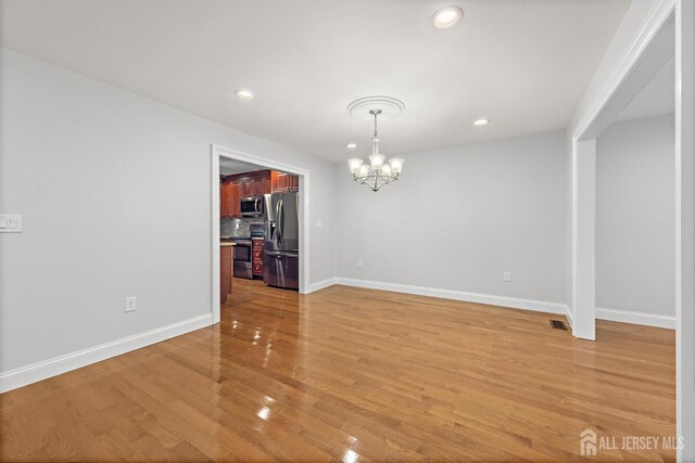 15-A Betsy Ross Dr, Monroe, NJ 08831 - unfurnished dining area with a chandelier, recessed lighting, light wood-style floors, and baseboards