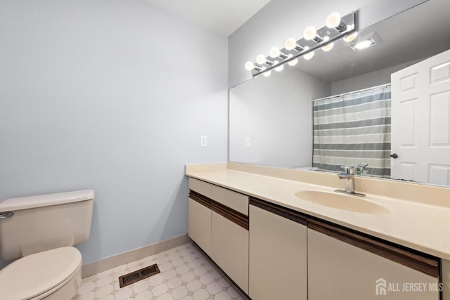 15-A Betsy Ross Dr, Monroe, NJ 08831 - bathroom with tile patterned floors, vanity, toilet, and baseboards