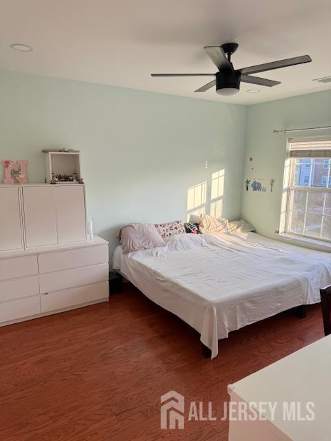 437 NE Micali Way S, Plainfield, NJ 07080 - bedroom featuring wood finished floors and ceiling fan