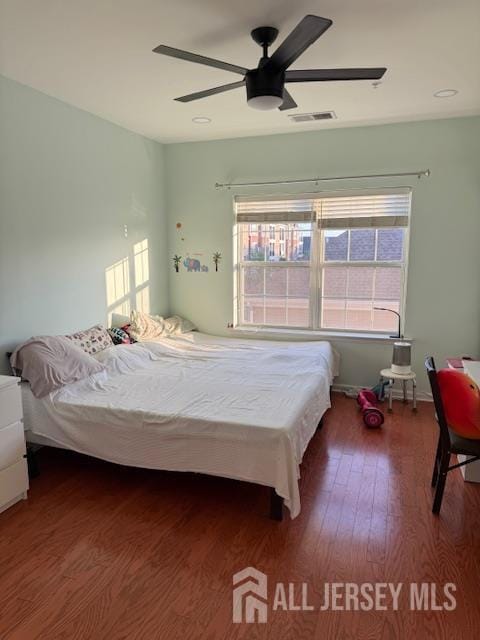 437 NE Micali Way S, Plainfield, NJ 07080 - bedroom featuring wood finished floors and a ceiling fan