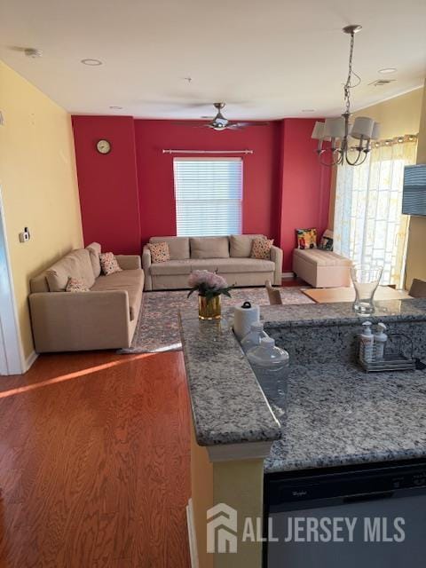 437 NE Micali Way S, Plainfield, NJ 07080 - living room with wood finished floors, a chandelier, and ceiling fan