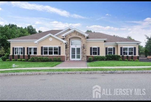 437 NE Micali Way S, Plainfield, NJ 07080 - traditional-style house featuring a front lawn, french doors, and stone siding
