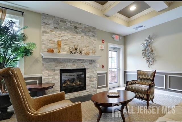 437 NE Micali Way S, Plainfield, NJ 07080 - sitting room featuring ornamental molding, coffered ceiling, beam ceiling, wainscoting, and a stone fireplace