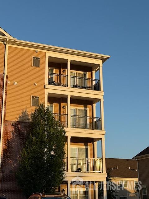 437 NE Micali Way S, Plainfield, NJ 07080 - back of house featuring a balcony