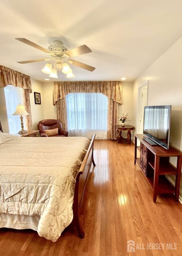 57 Yorktown Rd, South Brunswick, NJ 08852 - bedroom with wood-type flooring and ceiling fan