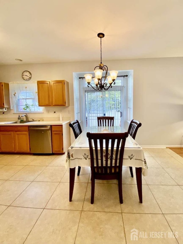 57 Yorktown Rd, South Brunswick, NJ 08852 - dining space featuring a chandelier and light tile patterned floors