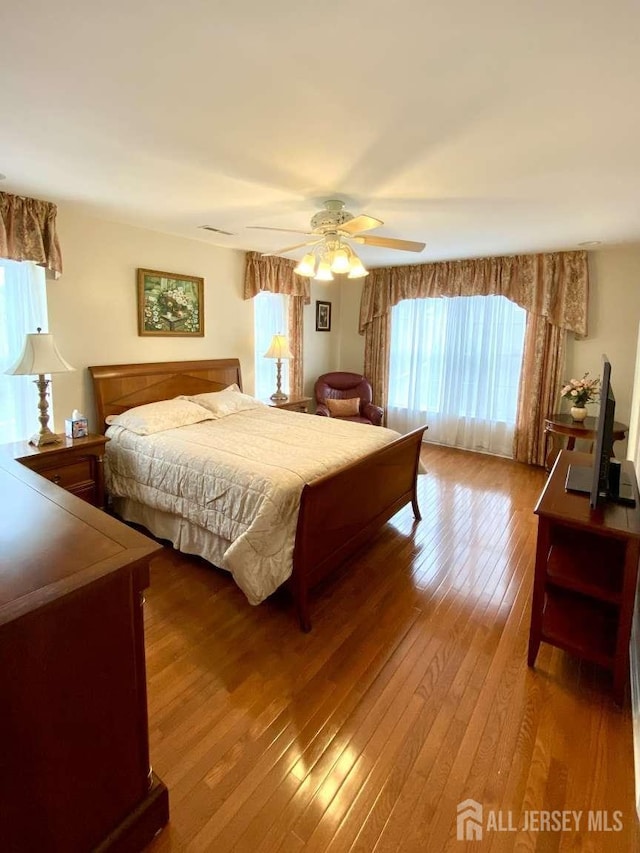 57 Yorktown Rd, South Brunswick, NJ 08852 - bedroom with hardwood / wood-style flooring and a ceiling fan