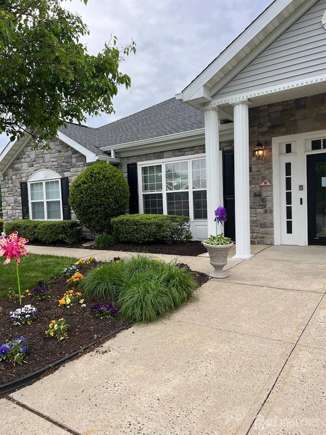 4 Linda Ct, Old Bridge, NJ 08879 - entrance to property with stone siding and roof with shingles