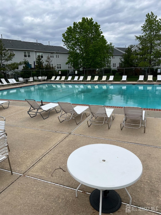 4 Linda Ct, Old Bridge, NJ 08879 - community pool featuring a patio area