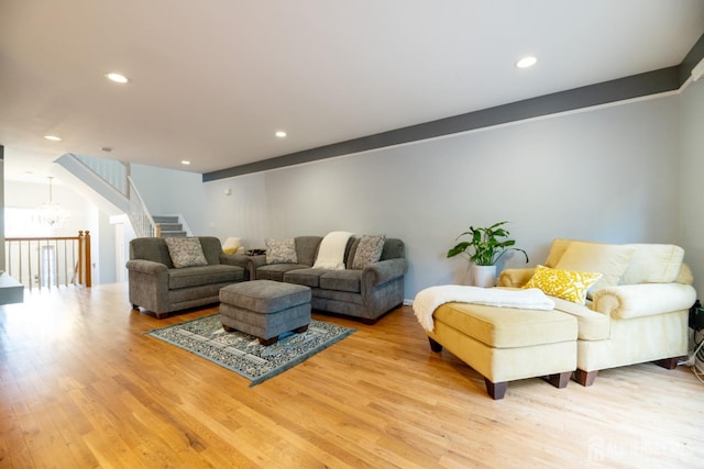 4 Linda Ct, Old Bridge, NJ 08879 - living room with light wood-style floors, recessed lighting, and stairs