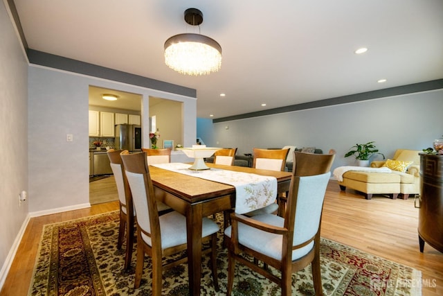 4 Linda Ct, Old Bridge, NJ 08879 - dining space with light wood-type flooring, a chandelier, and recessed lighting