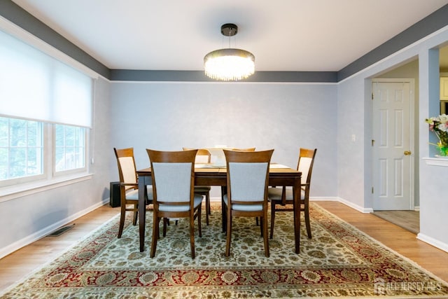 4 Linda Ct, Old Bridge, NJ 08879 - dining room with wood finished floors and baseboards