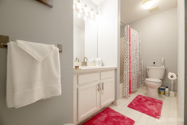 4 Linda Ct, Old Bridge, NJ 08879 - bathroom featuring vanity, tile patterned flooring, and shower / tub combo
