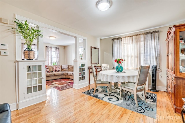 dining space featuring light hardwood / wood-style flooring