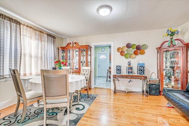 dining area featuring hardwood / wood-style flooring