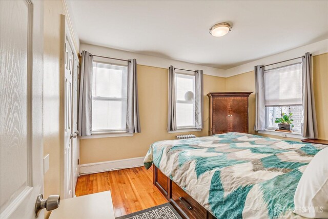 bedroom with light wood-type flooring