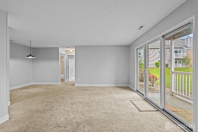 8113 Tamarron Dr, Plainsboro, NJ 08536 - spare room with a textured ceiling, light carpet, and baseboards