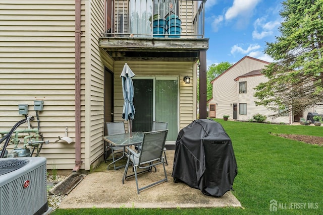 view of patio / terrace featuring central AC, grilling area, and a balcony