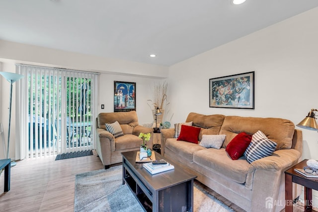 living room featuring recessed lighting and wood finished floors