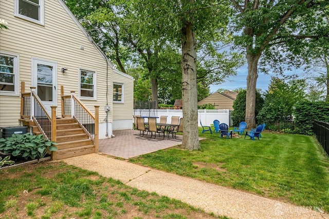 61 Thomas St, Metuchen, NJ 08840 - view of yard with a patio area and an outdoor fire pit