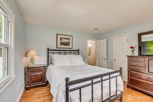 61 Thomas St, Metuchen, NJ 08840 - bedroom featuring light wood-type flooring and baseboards