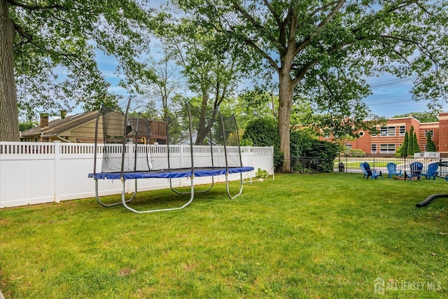 61 Thomas St, Metuchen, NJ 08840 - view of yard with a trampoline